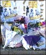 Flowers at the scene of the shooting