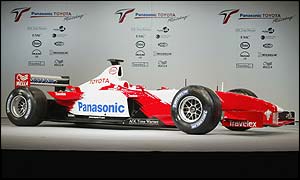 Toyota's new Formula One car sits parked up for the watching media to admire
