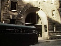 Police bus parked outside the entrance of LSE