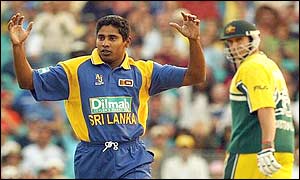 Sri Lanka's Chaminda Vaas celebrates the wicket of Adam Gilchrist