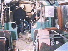 Investigator examine crashed tube train in Moorgate station