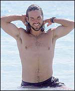 Pat Rafter on the beach