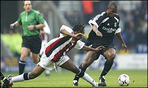 Bolton's Ricardo Gardner fails to tackle Fulham's Martin Djetou