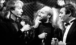 Robin Gibb, Maurice Gibb, and Tony Blackburn on Top of the Pops 1988