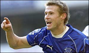 Brian McBride celebrates his goal on his Everton debut at White Hart Lane