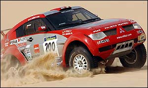 Hiroshi Masuoka begins climbing a dune