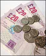 Twenty pound notes and some coins