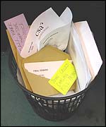 Invoices in a bin