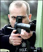 Police with baton gun