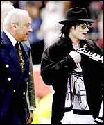Mohamed Al Fayed and Michael Jackson at Craven Cottage in 1999