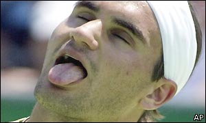 Roger Federer sticks his tounge out during his win over Lars Burgsmuller