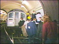Passengers are led to safety through tube tunnel