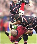 Gloucester's Peter Buxton produced a big tackle on Peter Stringer