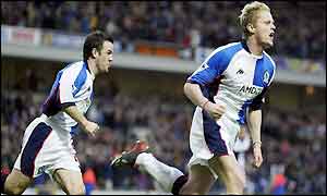 Damien Duff roars with delight after scoring to put Blackburn ahead