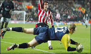 Liverpool keeper Chris Kirkland dives to make a save