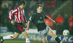 John Arne Riise runs past his marker on another attack for Liverpool