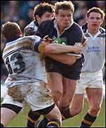 Brian O'Driscoll break through Andrew Higgins' tackle for the second try