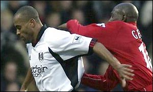 Alain Goma tangles with Geremi