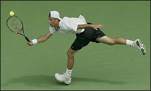Lleyton Hewitt of Australia in action against Younes El Aynaoui of Morocco 