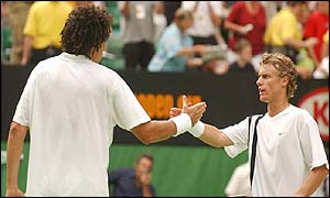 The two players shake hands at the end of a thrilling match