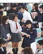 School graduates and students at a job fair in Ginowan, Okinawa