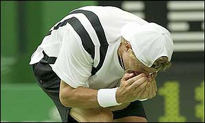 Lleyton Hewitt shows his frustration on court as he fails to shake his Moroccan opponent