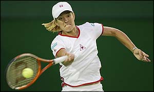 Justine Henin-Hardenne smashes a forehand as she nears victory over Ruano Pascual