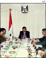 Iraqi President Saddam Hussein addressing military officers at the presidential palace in Baghdad