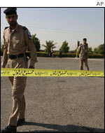 Kuwaiti police at the entrance of Camp Doha, Kuwait