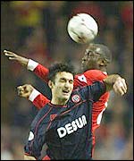 Liverpool striker Emile Heskey and Sheffield United's Shaun Murphy