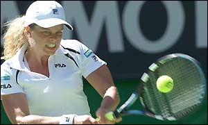 Belgium's Kim Clijsters plays a two-handed forehand