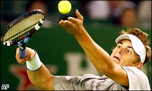 America's Andy Roddick serves during his semi-final against Germany's Rainer Schuettler