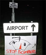 Visitors to the airport are reminded of the US military presence 