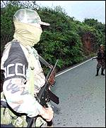 AUC rebel manning a roadblock