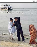 A man mourns after learning his relatives died in the disaster