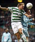 Johan Mjallby wins the header