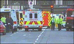 Ambulances wait outside the station