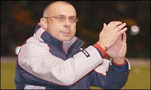 Dagenham and Redbridge manager Garry Hill salutes the fans