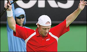 Rainer Schuettler struggles to come to terms with Agassi 's power