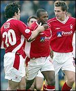 David Johnson (centre) is congratulated by his team-mates