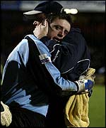 Tony Roberts needs consoling after Dagenham's exit from the FA Cup