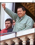 Venezuelan President Hugo Chavez waves to the crowd in Brazil