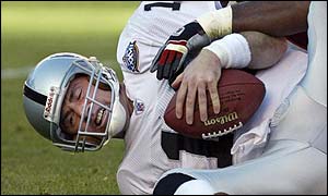 Oakland Raiders quarterback Rich Gannon is sacked by Tampa Bay Buccaneers 