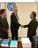 Iraq hands over weapons dossier, December, 2002