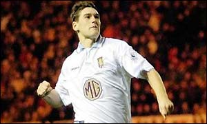 Gareth Barry celebrates scoring Aston Villa's third goal