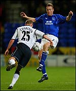 Everton's Steve Watson challenges Simon Charlton