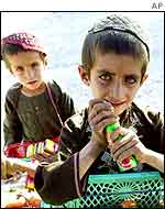 Boys selling sweets AP