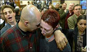 Labour party supporters console each other