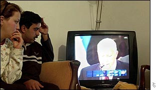 Palestinians follow the result from their home in Ramallah