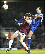 Joe Cole of West Ham (left) and Lucas Neill